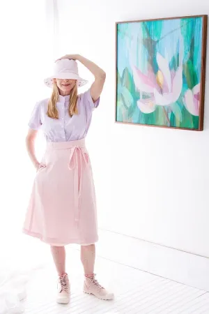 EVERYDAY BEAUTIFUL A-LINE APRON WRAP SKIRT IN SOFT PINK LINEN